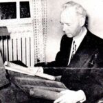 Otto F. Linn studying a Greek manuscript
